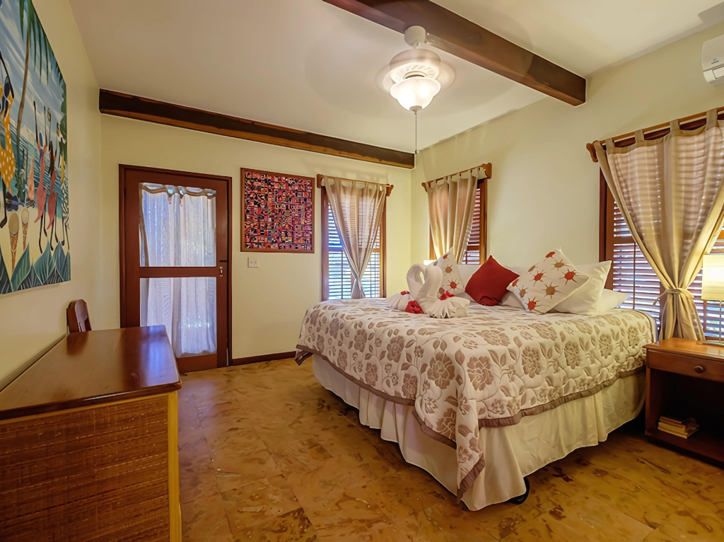 Bedroom with King bed and patio access